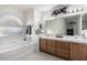 Bathroom boasts double sinks and a relaxing bathtub at 1212 E Butler Dr, Chandler, AZ 85225