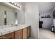 Small bathroom with single sink and access to bedroom at 1212 E Butler Dr, Chandler, AZ 85225