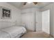 Small bedroom with closet and wrought iron bed at 1212 E Butler Dr, Chandler, AZ 85225