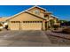 Two-story house with a three-car garage and landscaped front yard at 1212 E Butler Dr, Chandler, AZ 85225