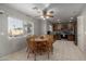 Kitchen with granite countertops, wooden cabinets and a breakfast nook at 1212 E Butler Dr, Chandler, AZ 85225