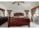 Main bedroom with dark wood furniture and lots of natural light at 1212 E Butler Dr, Chandler, AZ 85225