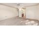 Bedroom with carpeting, ceiling fan and ensuite bathroom at 12307 W Westgate Dr, Sun City West, AZ 85375