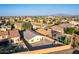 Aerial view of house with pool and solar panels at 1844 S 238Th Ln, Buckeye, AZ 85326