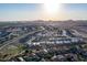 Aerial view of a residential neighborhood with houses and open space at 1844 S 238Th Ln, Buckeye, AZ 85326