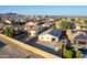 Aerial view of house and neighborhood at 1844 S 238Th Ln, Buckeye, AZ 85326