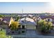 Aerial view of house and neighborhood at 1844 S 238Th Ln, Buckeye, AZ 85326