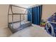 bedroom with gray bed and play tent at 18611 N 22Nd St # 2, Phoenix, AZ 85024
