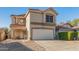 Charming two-story home with a terracotta roof and well-maintained front yard at 18611 N 22Nd St # 2, Phoenix, AZ 85024