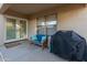 Covered patio with seating and built-in grill at 18611 N 22Nd St # 2, Phoenix, AZ 85024