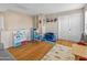 Spacious playroom with hardwood floors, ample storage, and creative play areas at 18611 N 22Nd St # 2, Phoenix, AZ 85024