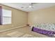 Bedroom with a bed, ceiling fan, and window coverings at 1923 N Cocoa Ct, Casa Grande, AZ 85122