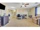 Spacious bedroom with a desk, chair, and a hanging chair at 1923 N Cocoa Ct, Casa Grande, AZ 85122