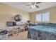 Bedroom with a bed, desk, and window coverings at 1923 N Cocoa Ct, Casa Grande, AZ 85122