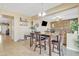 Bright dining area with table and chairs, adjacent to kitchen and Gathering room at 1923 N Cocoa Ct, Casa Grande, AZ 85122
