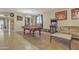 Game room features a pool table, arcade game, and comfortable seating at 1923 N Cocoa Ct, Casa Grande, AZ 85122