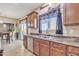 Kitchen with double sink, stainless steel dishwasher, and wood cabinets at 1923 N Cocoa Ct, Casa Grande, AZ 85122