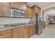 Kitchen boasting stainless steel appliances and gas cooktop at 1923 N Cocoa Ct, Casa Grande, AZ 85122