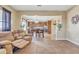 Living room with a view into the kitchen and a recliner at 1923 N Cocoa Ct, Casa Grande, AZ 85122
