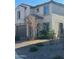 Two-story house with desert landscaping and a two-car garage at 19899 W Rancho Dr, Litchfield Park, AZ 85340