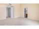 Spacious bedroom with carpet flooring and access to a bathroom at 2020 W Union Hills Dr # 201, Phoenix, AZ 85027