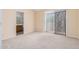 Bedroom with carpet flooring, access to a bathroom and private balcony at 2020 W Union Hills Dr # 201, Phoenix, AZ 85027