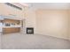 Open living room showcasing a fireplace and high ceilings at 2020 W Union Hills Dr # 201, Phoenix, AZ 85027