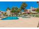 Community pool and spa with surrounding lounge chairs at 2020 W Union Hills Dr # 201, Phoenix, AZ 85027