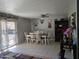 Bright dining room with a table and chairs, perfect for Gathering meals at 215 W Juniper St, Mesa, AZ 85201