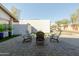 Outdoor patio space with seating and cornhole at 2230 N 87Th Ter, Scottsdale, AZ 85257