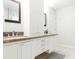 Bathroom with double vanity, a large shower, and a linen closet at 2230 N 87Th Ter, Scottsdale, AZ 85257