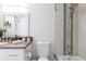 Clean bathroom with toilet, bathtub, and modern vanity at 2230 N 87Th Ter, Scottsdale, AZ 85257