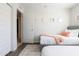 Cozy bedroom with twin bed, rug and access to bath at 2230 N 87Th Ter, Scottsdale, AZ 85257