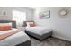 Twin bedroom with two beds, nightstand and decor at 2230 N 87Th Ter, Scottsdale, AZ 85257