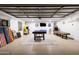 Game room with pool table, arcade games, and dartboard at 2230 N 87Th Ter, Scottsdale, AZ 85257