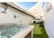 Hot tub with seating area and shade sails at 2230 N 87Th Ter, Scottsdale, AZ 85257