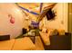 Evening view of a comfortable patio with seating and a TV at 2230 N 87Th Ter, Scottsdale, AZ 85257