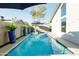 Inviting pool with blue pots and umbrella at 2230 N 87Th Ter, Scottsdale, AZ 85257