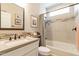 Well-lit bathroom featuring a modern vanity, tiled shower with mosaic accents, and stylish decor at 267 E Santa Lucia Ln, Queen Creek, AZ 85140