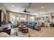 Spacious living room features stylish decor, large windows, and an open floor plan perfect for entertaining at 267 E Santa Lucia Ln, Queen Creek, AZ 85140