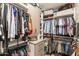 Spacious walk-in closet with custom shelving and plenty of storage for an organized wardrobe at 267 E Santa Lucia Ln, Queen Creek, AZ 85140