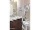 Bathroom with granite vanity, tub shower, and updated fixtures at 2827 E Bellerive Dr, Gilbert, AZ 85298