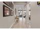 Bright entry hall showcasing views to the living room and kitchen at 2827 E Bellerive Dr, Gilbert, AZ 85298