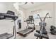 Bright home gym with various exercise equipment at 2827 E Bellerive Dr, Gilbert, AZ 85298
