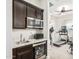 Home gym with treadmill, weights, and exercise machines at 2827 E Bellerive Dr, Gilbert, AZ 85298