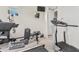 Home gym with Bowflex and treadmill at 2827 E Bellerive Dr, Gilbert, AZ 85298