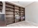 Built-in shelving unit with electric fireplace at 2827 E Bellerive Dr, Gilbert, AZ 85298