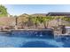 Water feature with tile accents and a cascading waterfall at 2827 E Bellerive Dr, Gilbert, AZ 85298