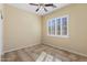 Bedroom with tile flooring and window with blinds at 2832 E Flower St, Gilbert, AZ 85298