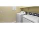 Laundry room with washer and dryer included at 2832 E Flower St, Gilbert, AZ 85298